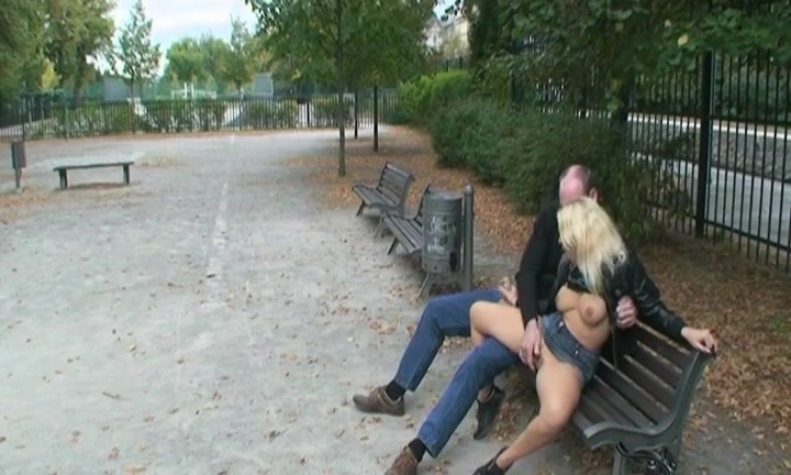 Horny couple fucking on public bench